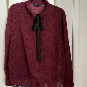 Sheer burgundy and black blouses
